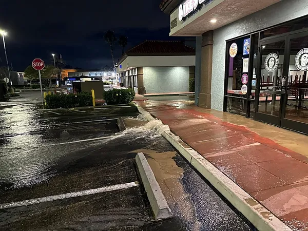 Midway District flooding and water-main break disrupt San Diego businesses, prompting road closures and emergency shelter use